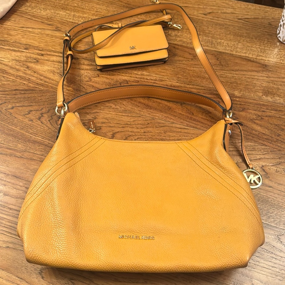 Michael Kors two-way shoulder bag and matching wallet with optional strap.